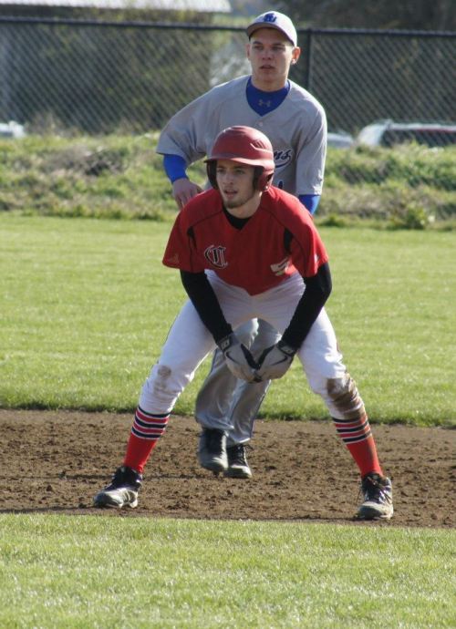 "Well, I'm Kurtis Smith and I'm gonna steal that base before you finish reading this..." (Shelli Trumbull photo)