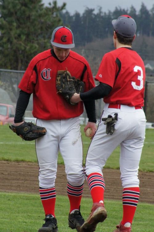 Korbin Korzan (left) and Ben Etzell have a chat on the mound.