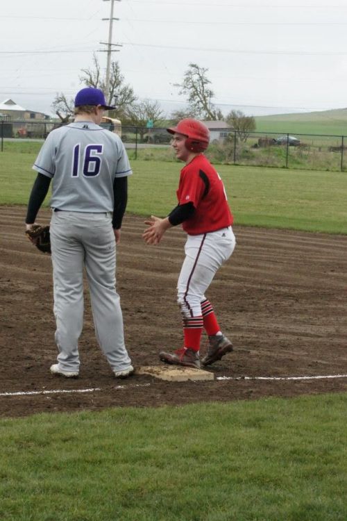 Chan shares a moment with the Nooksack Valley first-baseman. "No, I can't feel my fingers, either, man!"