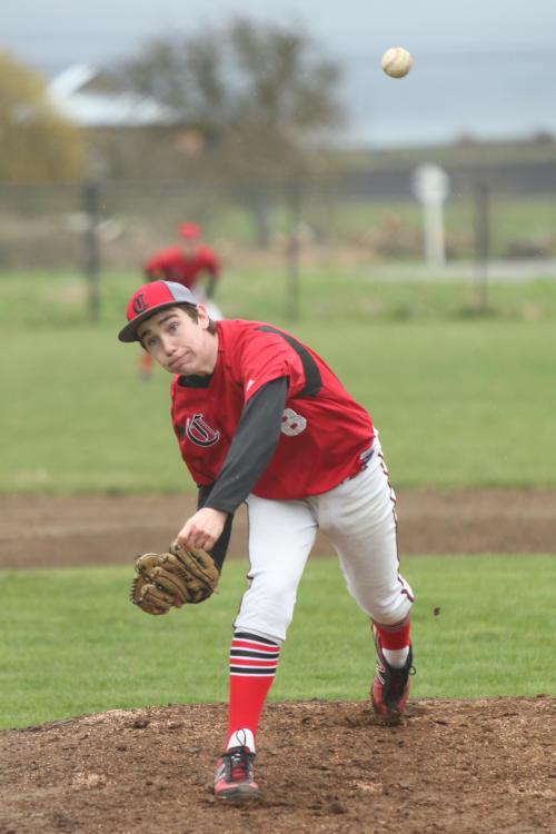 Aaron Trumbull flings the high, hard cheese.