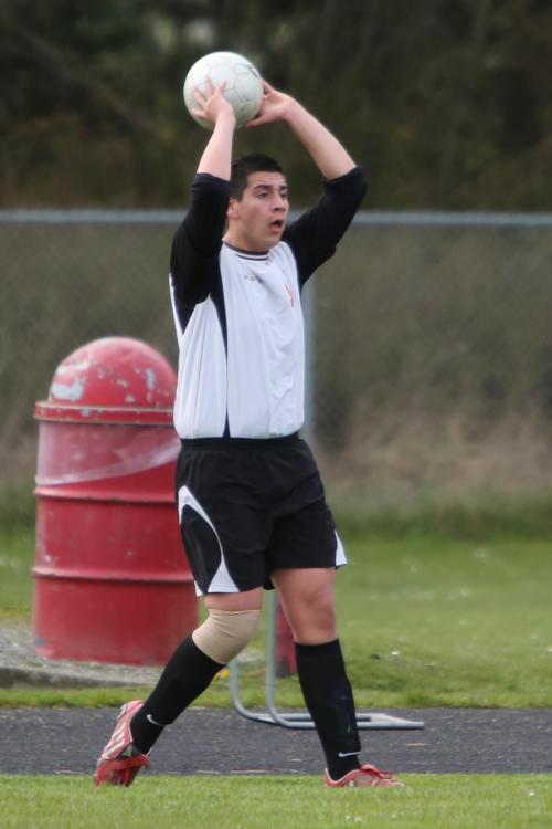 Co-captain Oscar Liquidano prepares to trigger the play.