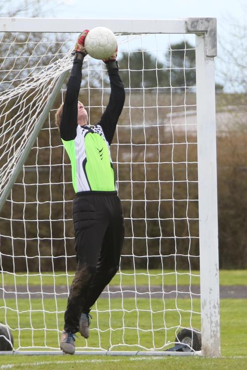 Connor McCormick elevates for a save.