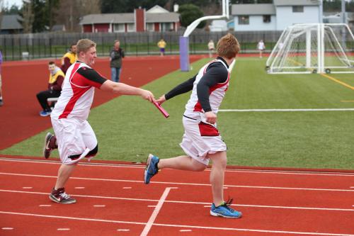The CHS throwers competed off the books in a a relay race. Here, Carson Risner hands off to a ready-to-rumble Caleb Valko.