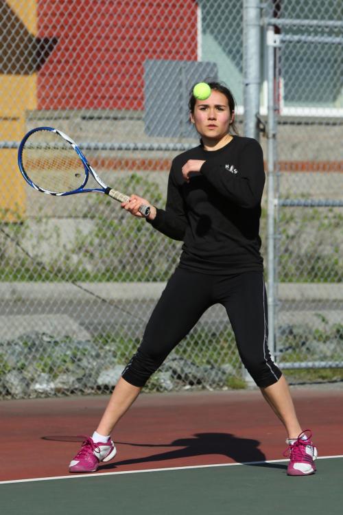 Amanda d'Almeida prepares for a return during her win at first singles. (John Fisken photos)
