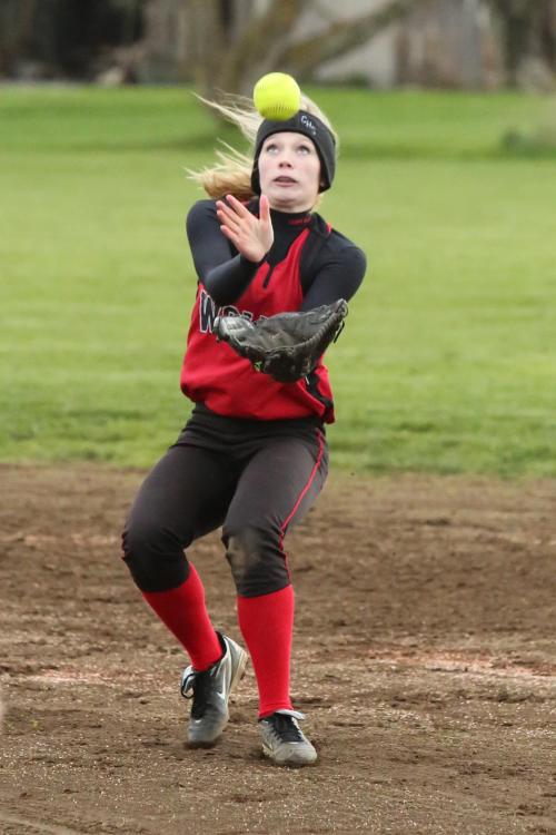 Breeanna Messner gets two hands on the ball on a windy day.