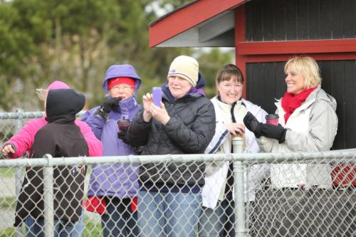And yet, mom Aimee Bishop (far right) smiles through the pain. How DOES she do it?!?!