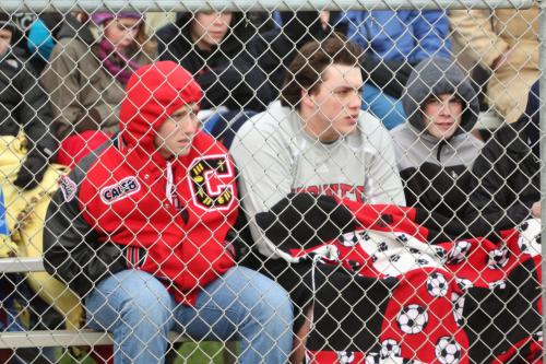 Left to right, Wolf football players Caleb Valko, Nick Streubel and Kyle Kendall enjoy Opening Day.
