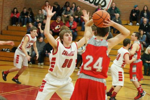 Morgan Payne applies pressure during Coupeville's home game against King's. The Knights finished 2nd at the 1A state tourney. (Shelli Trumbull photo)