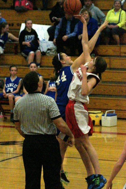 Katrina McGranahan skies for the opening tip in the day's best game. (Justine McGranahan photos)