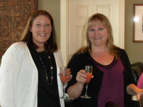 Shelli Trumbull (right) hobnobbing with fellow local celebrity Jill Johnson.