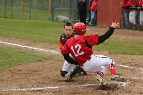 Josh Bayne heads home in a hurry. Carrying a GPA above 3.5, he's probably on his way to do some homework. (John Fisken photos)