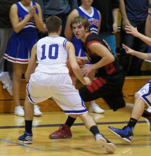 Morgan Payne faces pressure from future All-State player Spencer Novak (10) during a game at La Conner. (Shelli Trumbull photo)