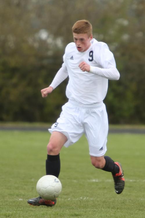 Jeremey Copenhaver heads up-field on the way to scoring one of his three goals.