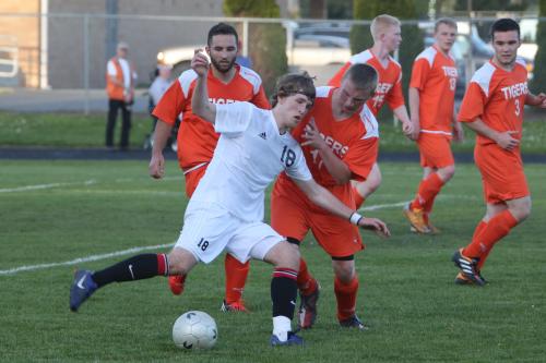 Josh Wilsey, lost in a sea of orange, yet still in control of the ball.