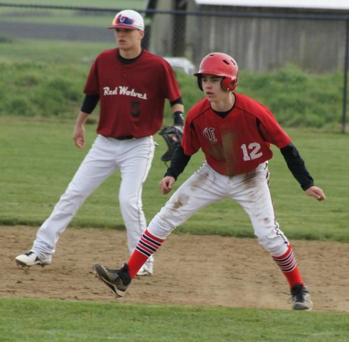 Josh Bayne dances on the base paths.