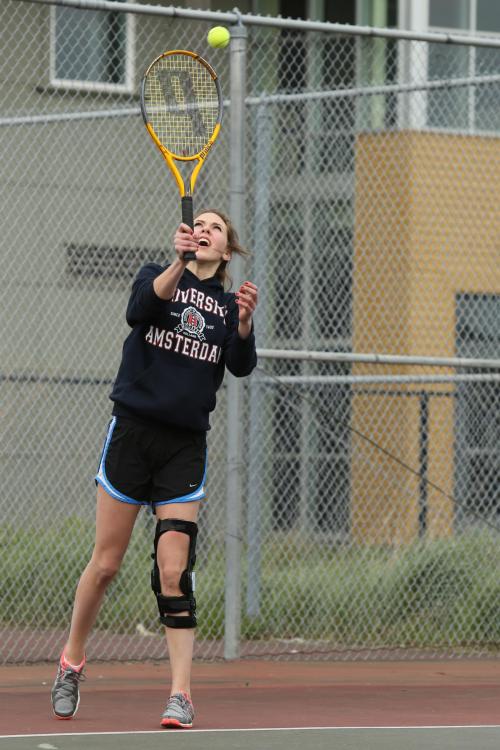 Julia Myers takes an overhead.