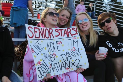 Left to right, fans Katie Kiel, Holly Craggs, Emily Clay and Caleb Valko bring the spirit.