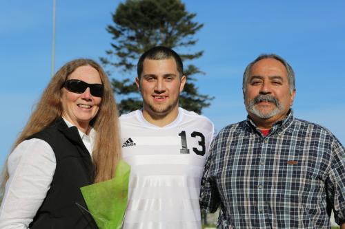 Danny Savlaza and parents Hank and Deb.