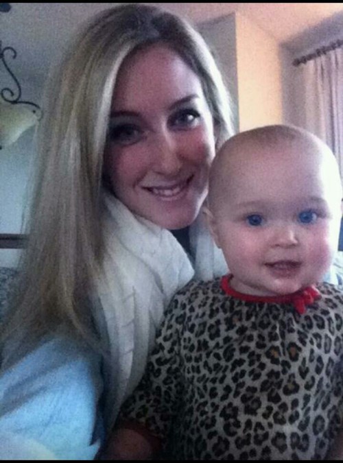 Former Wolf volleyball star Michelle Riddle and daughter Bria.