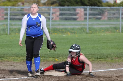 Madeline Roberts is so fast, she beats the throw to third by a solid minute.