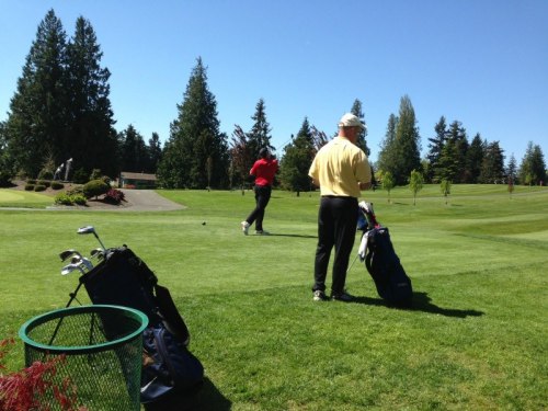 Austin Fields (in red) watches a majestic shot soar skywards.