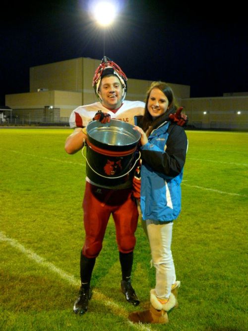 Danny Savalza and Kena Knott celebrate Coupeville beating South Whidbey this season and bringing The Bucket home.