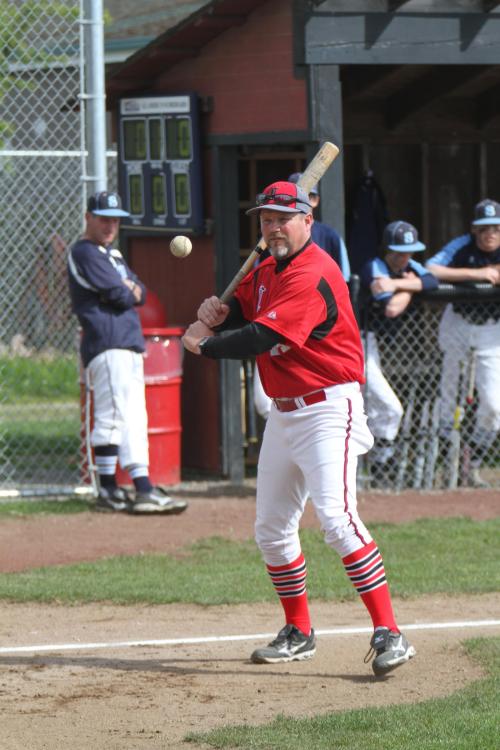 Wolf baseball guru Willie Smith gives his fielders some work. (Shelli Trumbull photos)