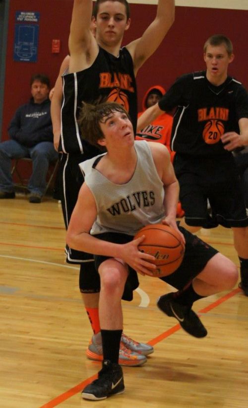 Cole Payne, back on the floor after surgery cost him his freshman season, looks for an opening in the defense.