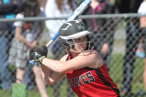 Madeline Roberts digs the long ball.