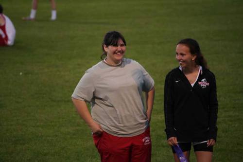 Wolf throwers Heni Barnes (left) and Rachel Wenzel enjoy each other's company. (Kerry Rosenkranz photo)
