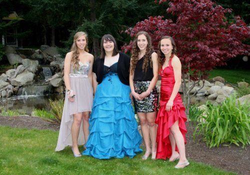 Rachel Wenzel (far right), seen here with fellow track stars (l to r) Anna Bailey, Heni Barnes and Marisa Etzell, closed her track career with a PR Thursday.