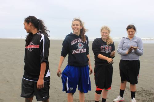 Life's a beach, but it's the look on Breeanna Messner's face (second from right) that makes the photo.