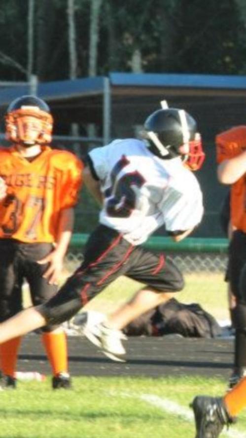 Mitchell Carroll, headed to the end zone.