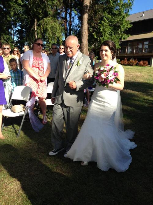 Boyd Wells brings the bride in.