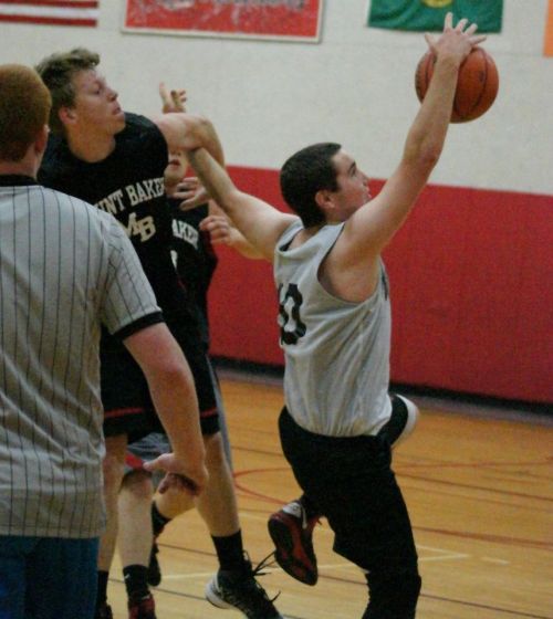 Aaron Trumbull battles for the ball while trying to keep from getting his arm ripped off.