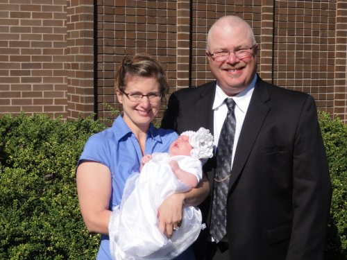 New Wolf coach Troy Cowan and wife Kelli, with one of their granddaughters.