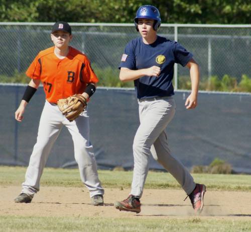 "Nothing to see here. Keep on ignoring me, Mr. Pitcher, and I, Aaron Trumbull, shall steal third in the most casual way possible..."