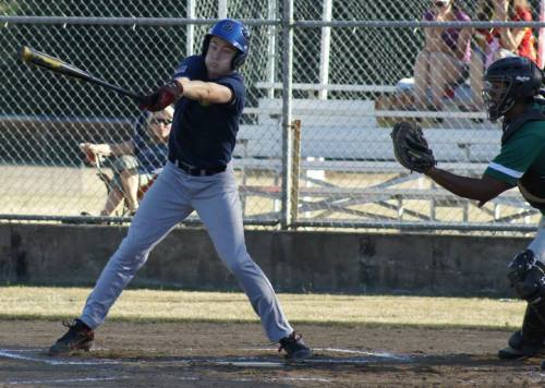 Aaron Curtin takes a mighty cut at the plate... (Shelli Trumbull photos)