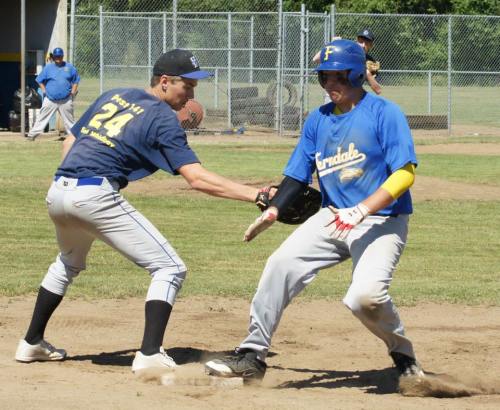 Falcon CJ Sutfin slaps the tag on an unhappy Ferndale runner.