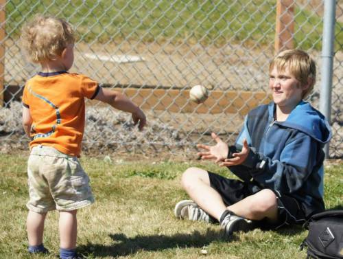 Future stars Lima Curtin (left) and Bryce Payne play catch. (Shelli Trumbull photos)