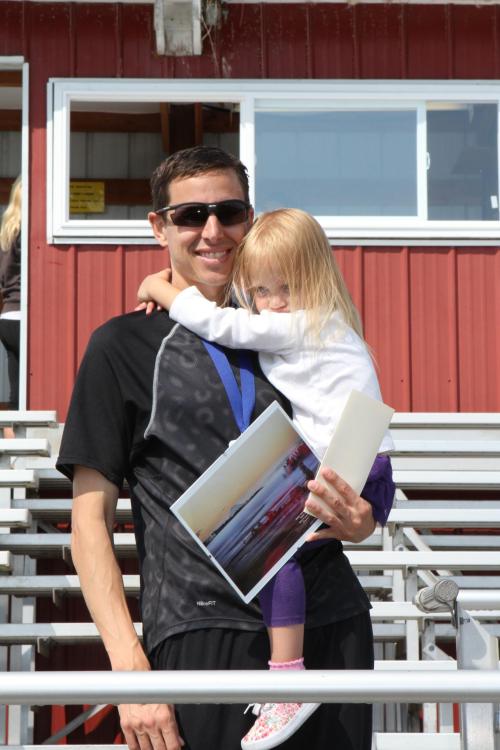 Half marathon male winner (and fan club).