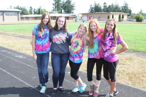 Race volunteers (l to r) Allie Hanigan, Hailey Hammer, Madeline Roberts, Shelby Hall and Sydney Aparicio.