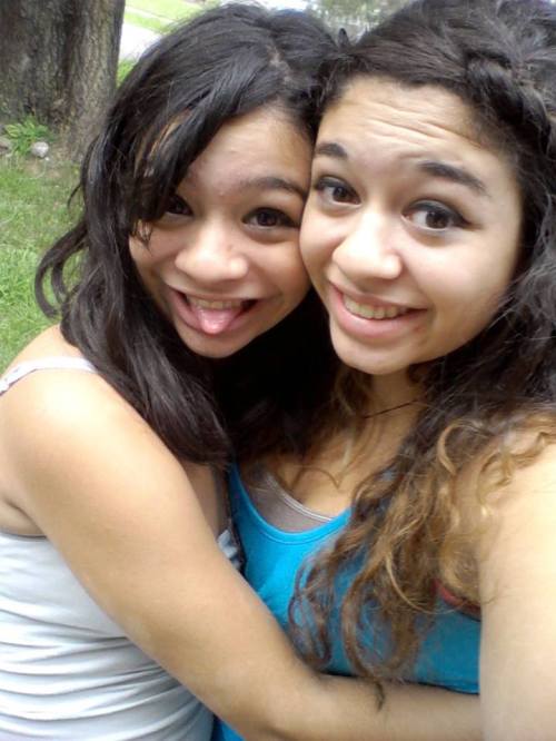 Bella Cedillo (right) and younger sister Robin share a moment.