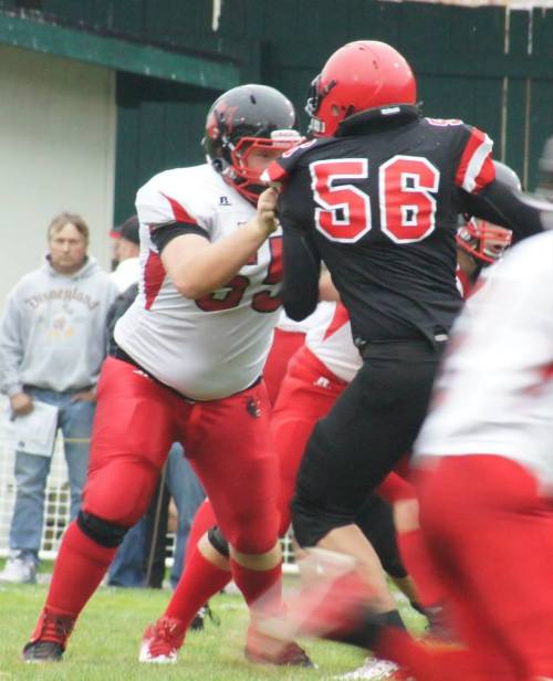 Wolf center Carson Risner (left) rumbles in the trenches.