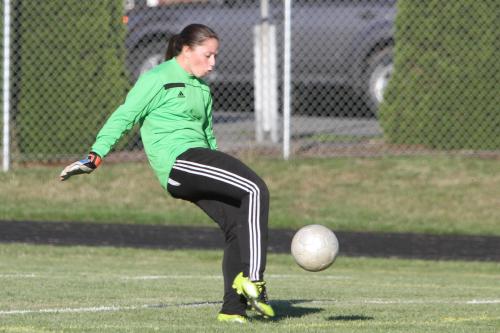Wolf goalie McKayla Bailey clears the net.