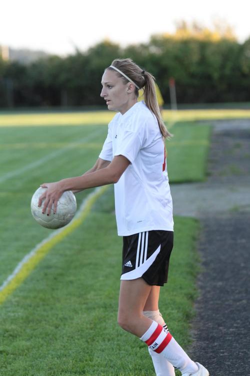 Tori Wellman, here preparing for a throw-in, punched in a goal of her own Thursday.