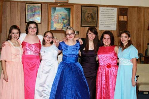 Addison Rasmussen, second from left, has become the second girl to join the CMS football team.