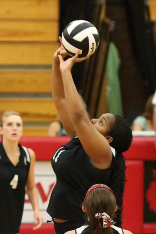Khanei Williams elevates for a ball.