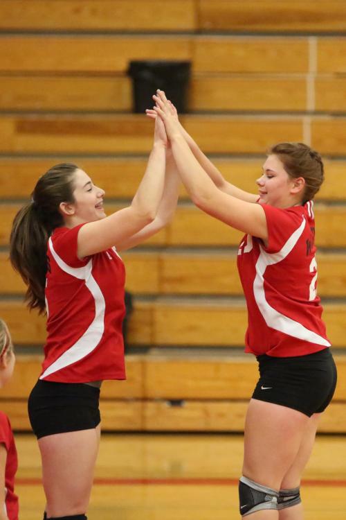 Haley Sherman (left) and Madeline Strasburg get fired up.