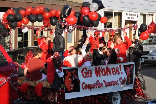 The Booster Club catches a ride. (LN)